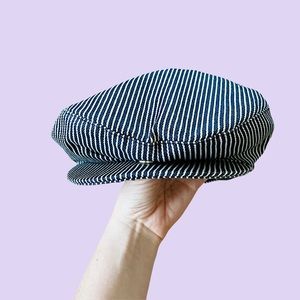 Blue and white striped flat cap